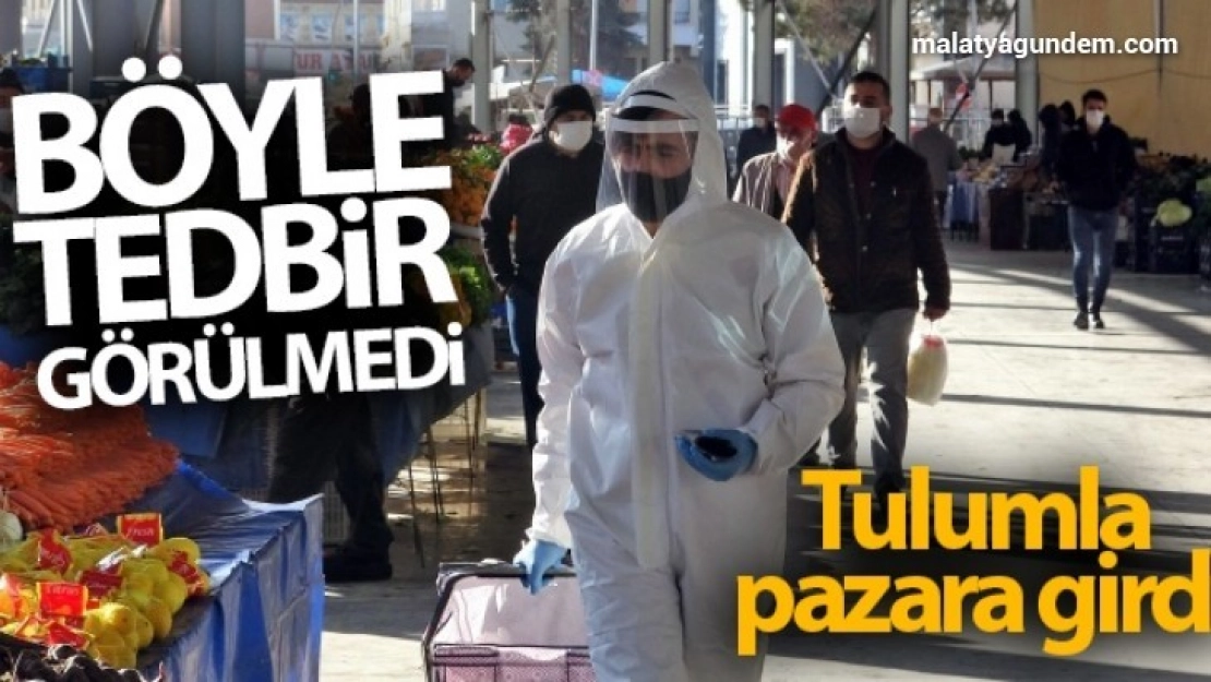 Böyle tedbir görülmedi, tulumla pazara girdi