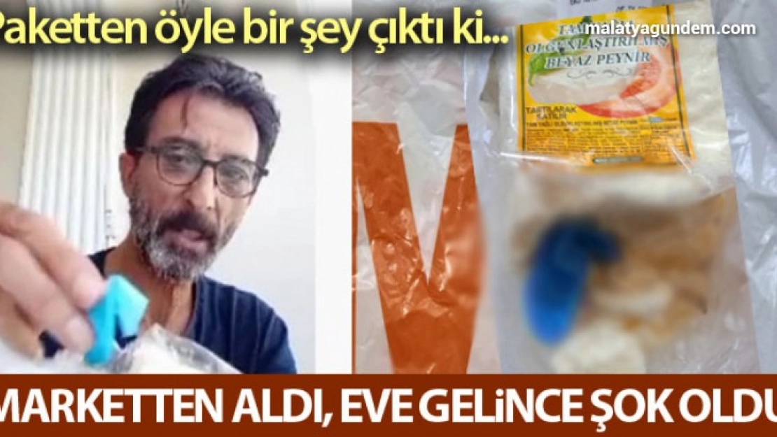 Marketten aldığı peynirin içinden eldiven çıktı