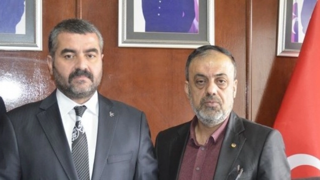 Özbey'e MHP'den Yardım Sözü