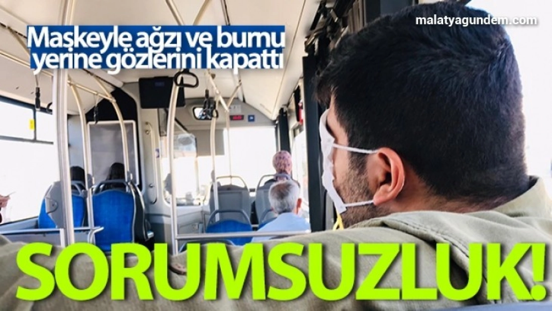 Otobüste yolculuk yaptı, maskeyle ağzı ve burnu yerine gözlerini kapattı