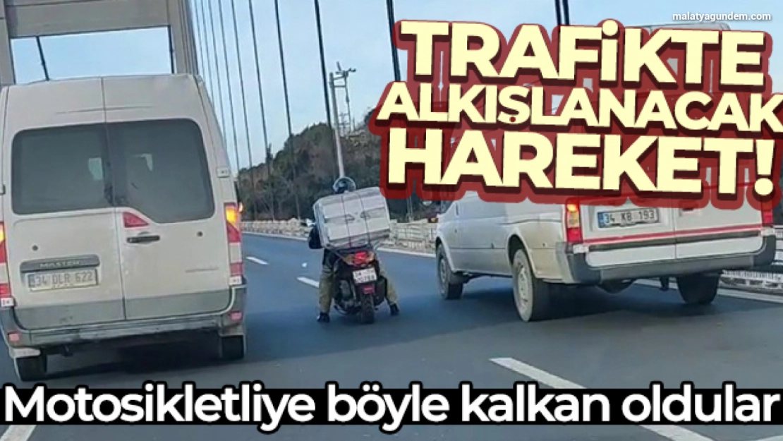 Şiddetli rüzgarda köprüden geçmeye çalışan motosikletliye böyle kalkan oldular