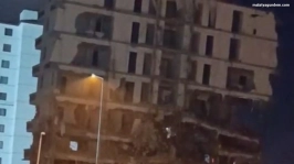 Ağır hasarlı 7 katlı bina saniyeler içerisinde yerle bir oldu