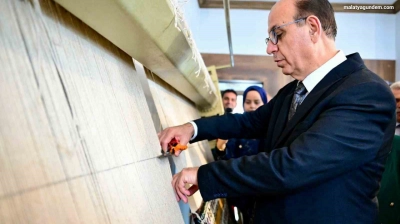 Başkan Geçit, halı dokuma kursunda kesim törenine katıldı