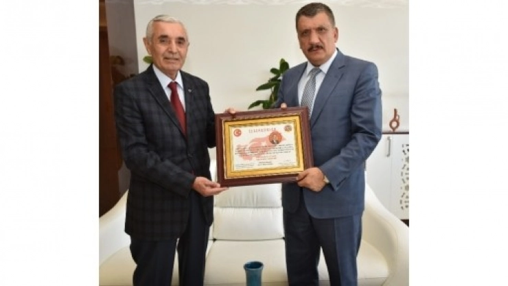 Başkan Gürkan'a Teşekkür Belgesi