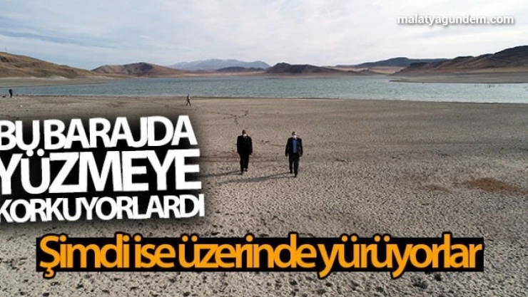 Yüzmeye korktukları barajın üzerinde yürüyorlar